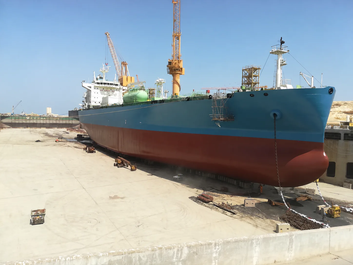 Blue-hull bow maintenance in dry dock